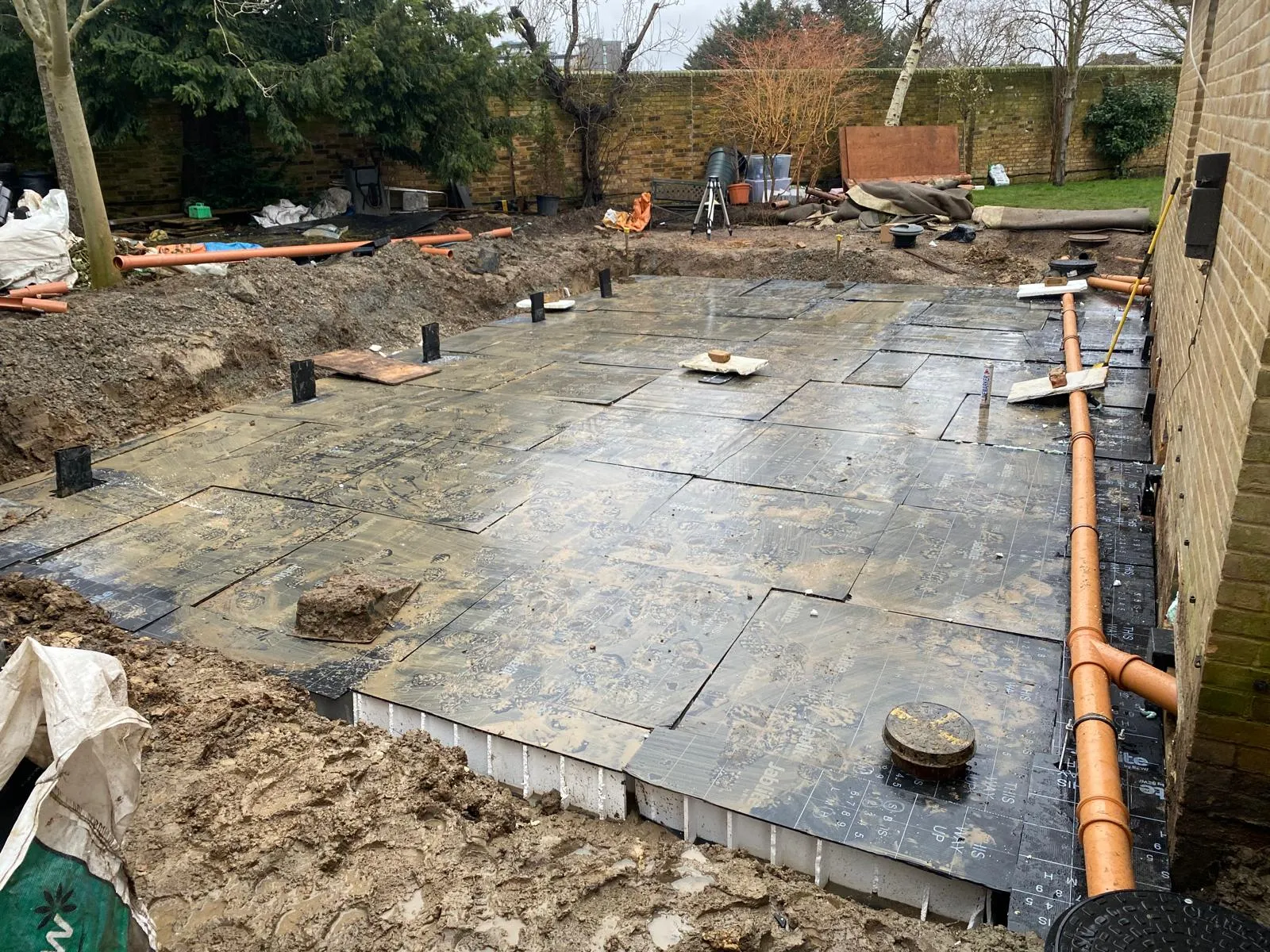 A house being built with a lot of concrete.